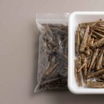 Bulk dried grasshoppers arranged for B2B quality and sourcing evaluation